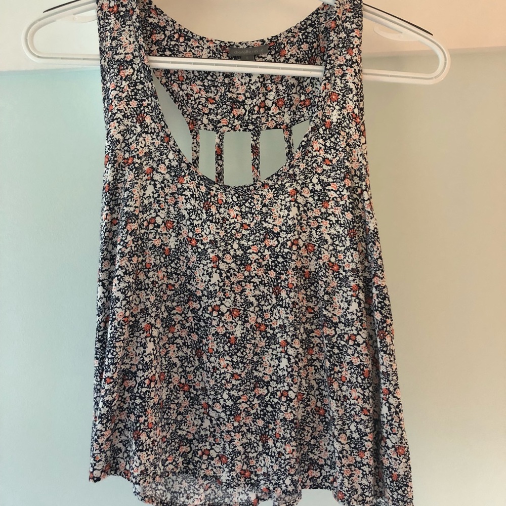 Charlotte Russe floral tank with openings on back